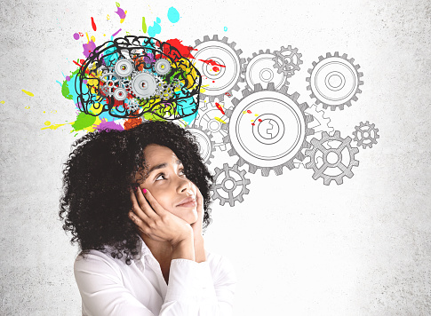 Girl looking up to imagine a brain image
